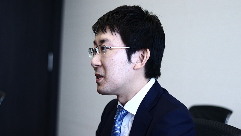 日本政策投資銀行の若手調査・ファイナンス担当である金子三紀雄さんの横顔